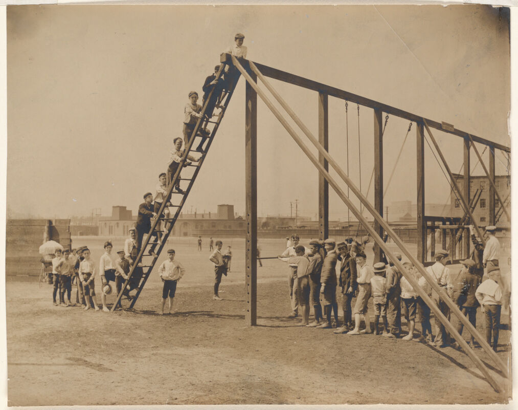 Image of Columbus Ave. playground. Gymnasium and boys exercising