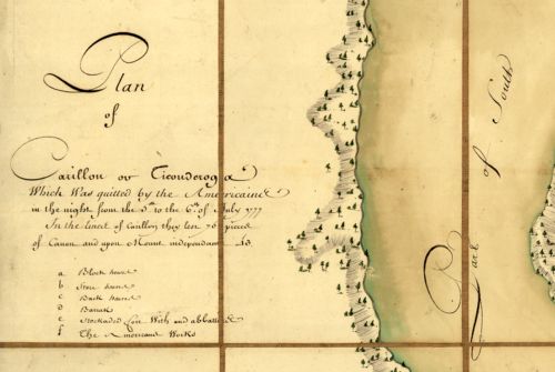 Detail of a manuscript map showing the title, an index key, and part of a shoreline. Limited detail is show, including the slope of the shore and some trees. The water is colored blue.