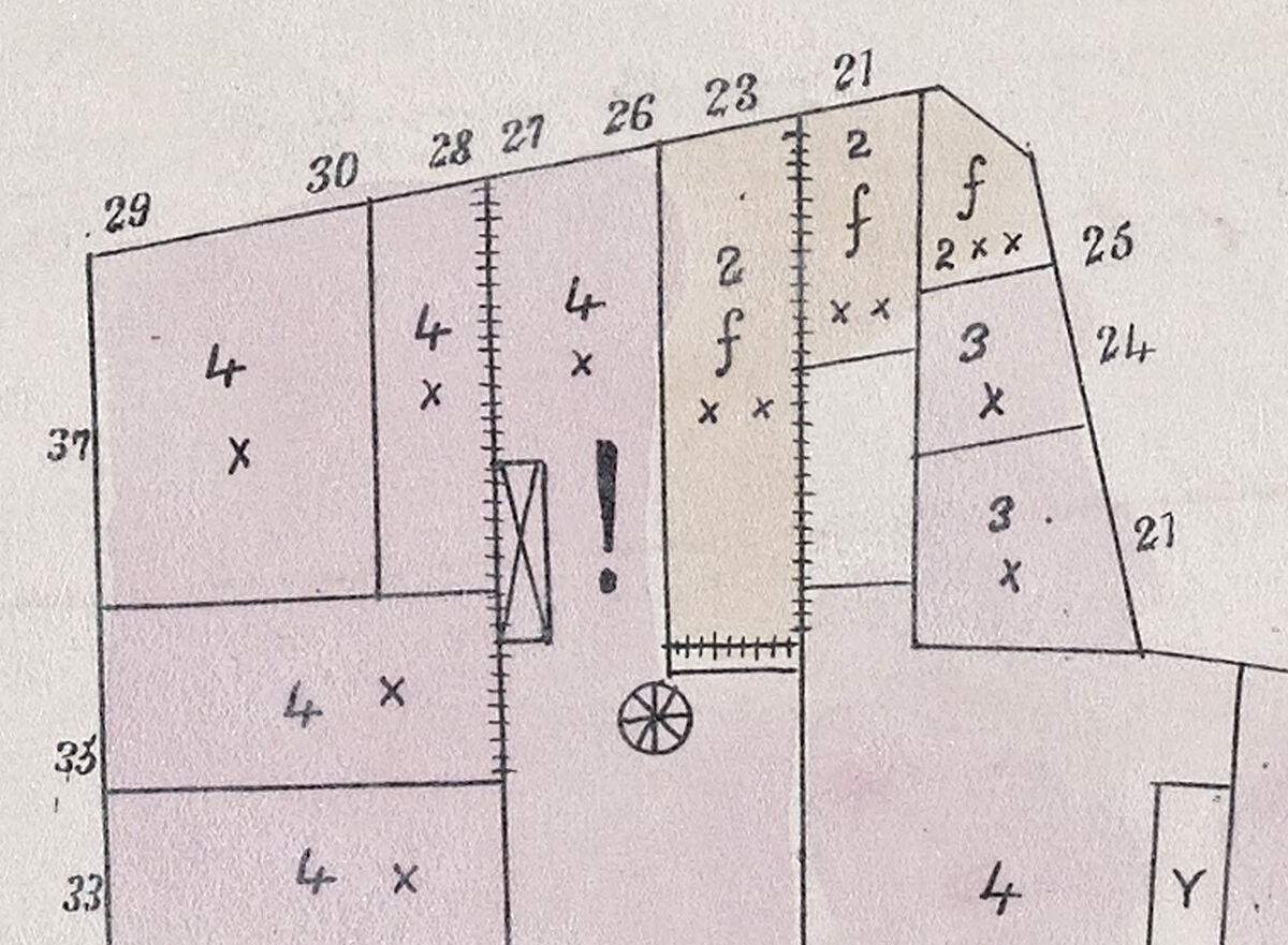 This detail from the 1861 Pinney Plan of the City of Boston depicts an exclamation point as a marker of high fire risk.